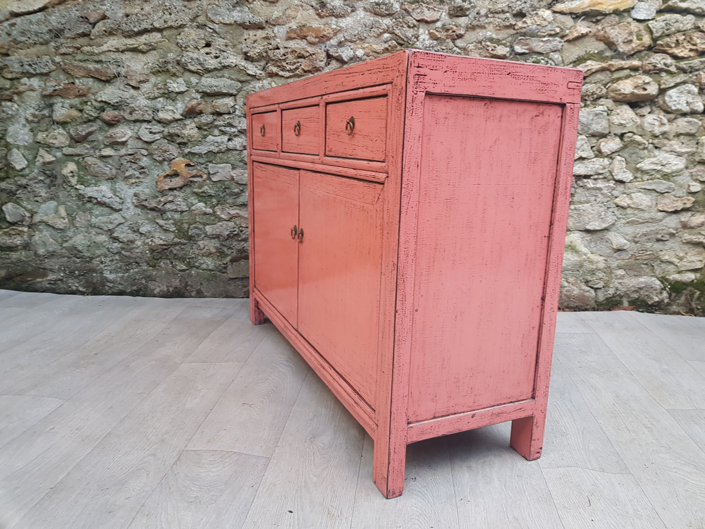 Buffet 3 tiroirs 2 portes rose clair laque cote gauche