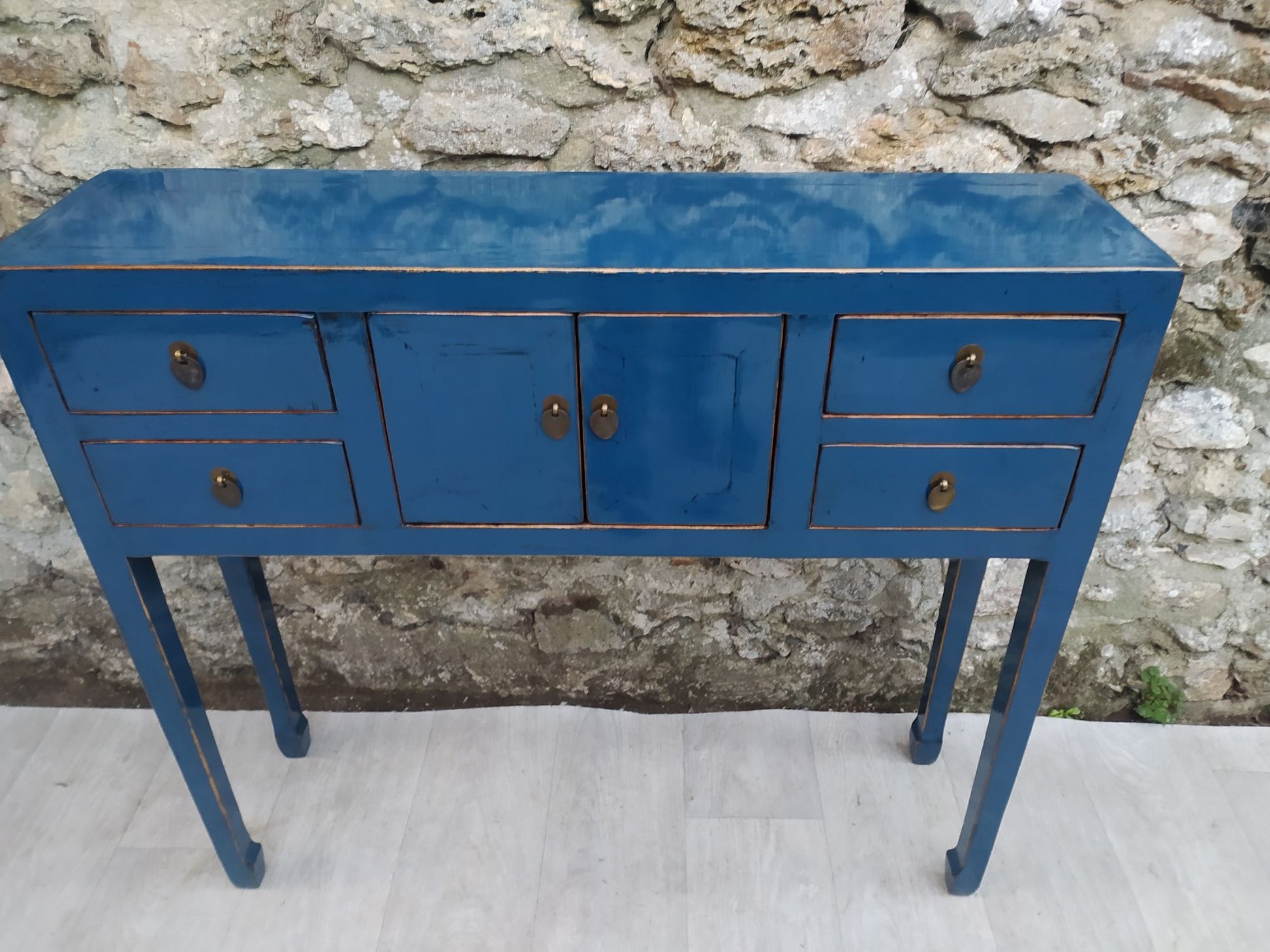 Console bleu pétrole laquée dessus